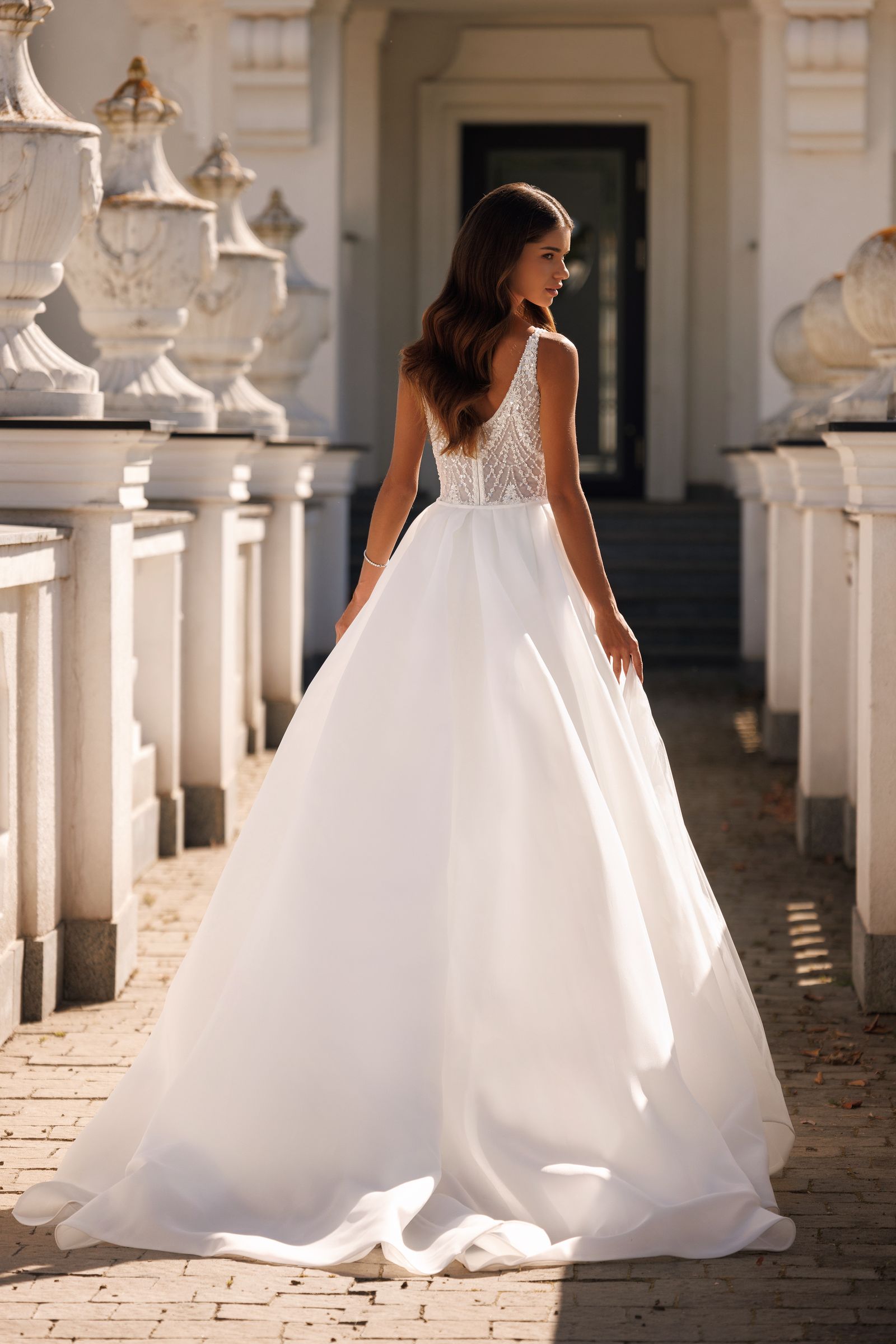 Elisia — sheath wedding dress, back view