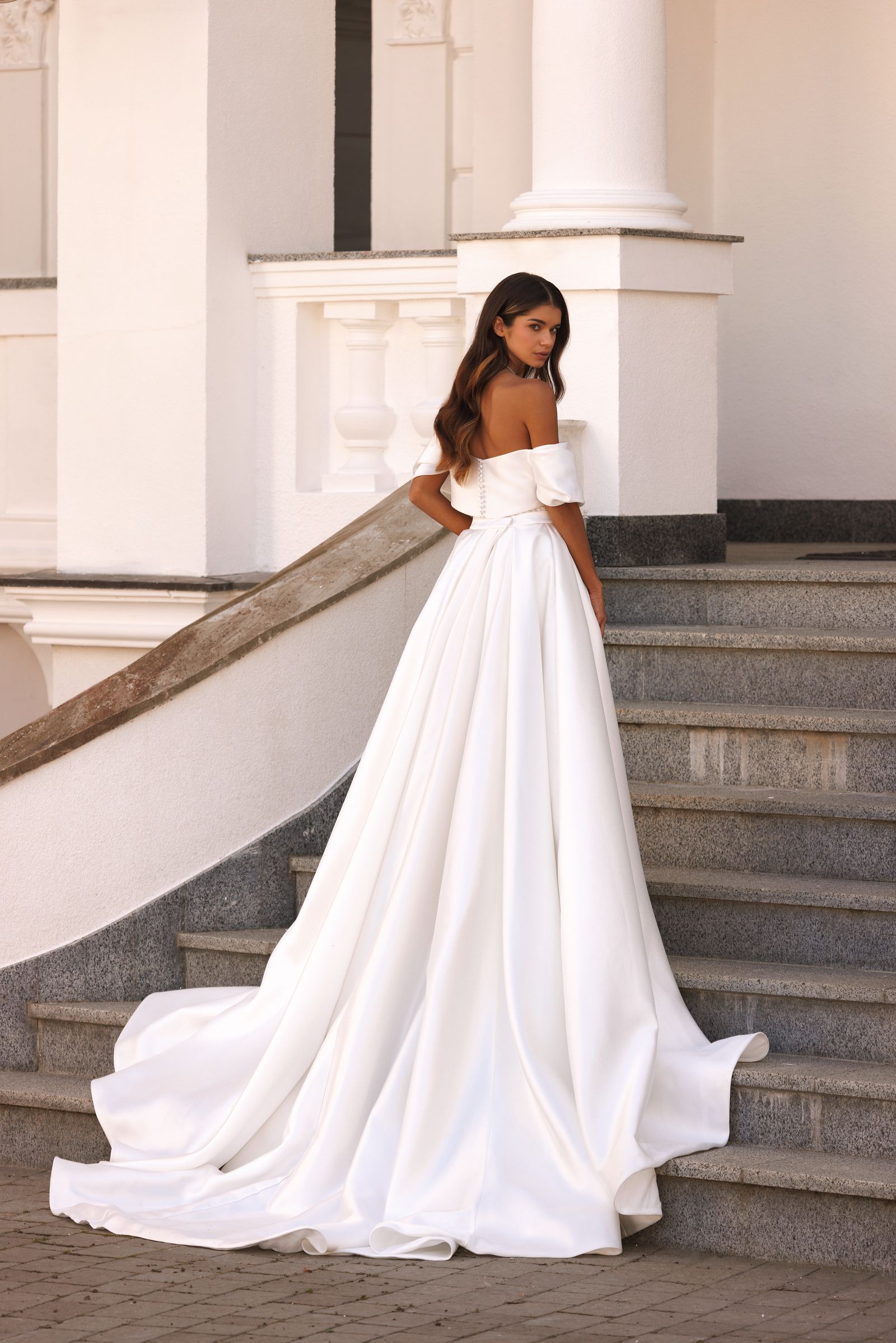 Evita — sheath wedding dress, back view